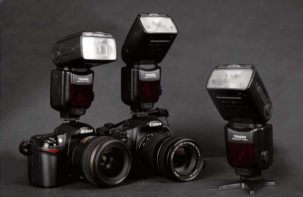 Triopo TTL Blitzgerät mit ISO 100, 54, 105mm, Canon Nikon